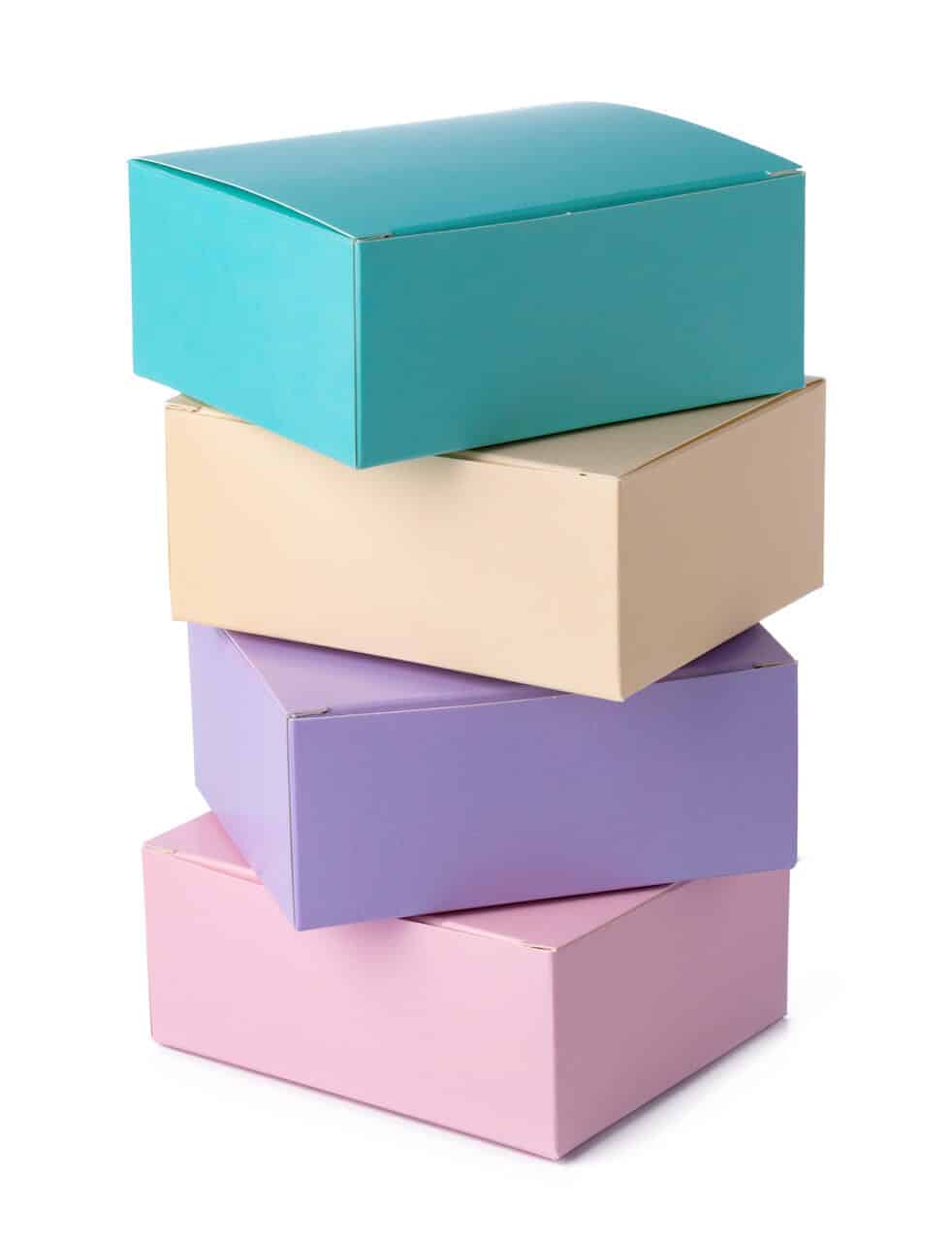 Colorful paper gift boxes isolated on white background