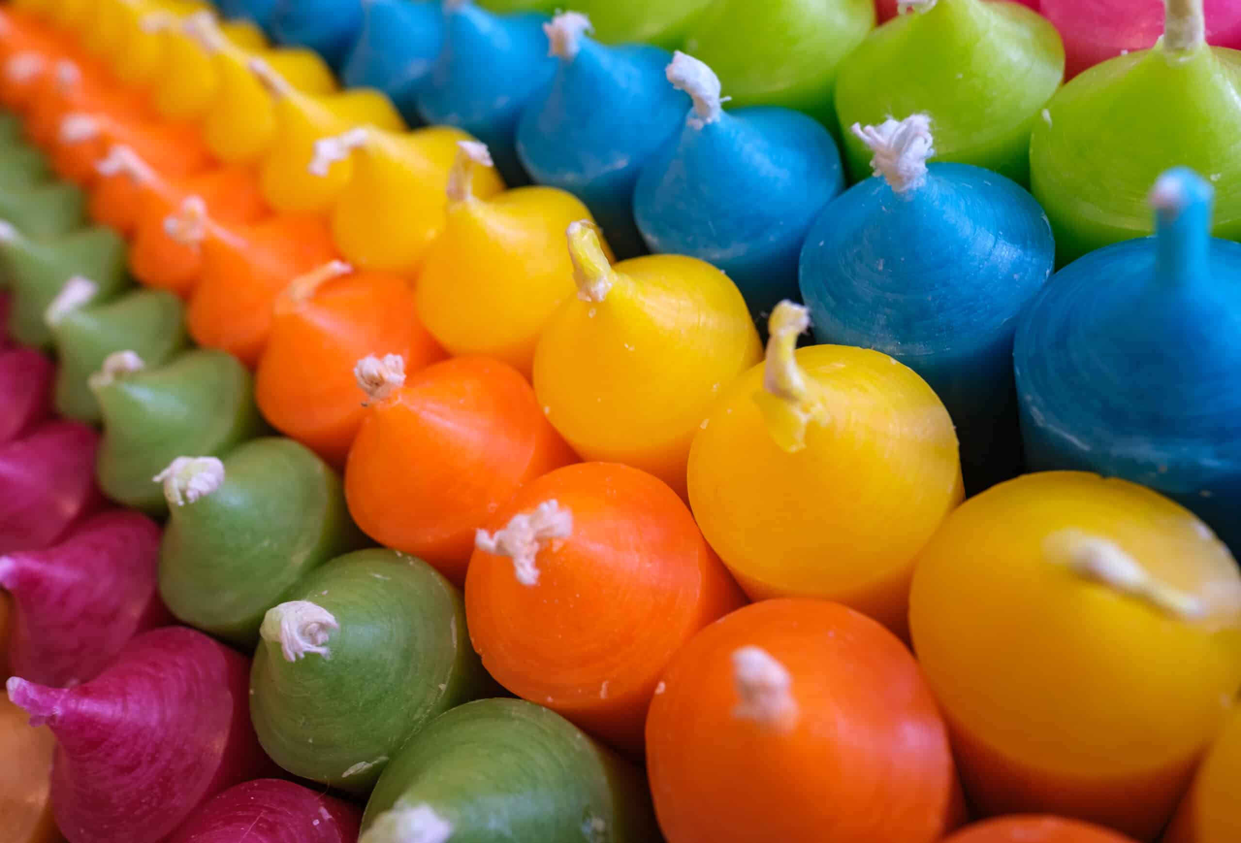 Abstract Background Texture Of Colourful Candles With Shallow Depth Of Field