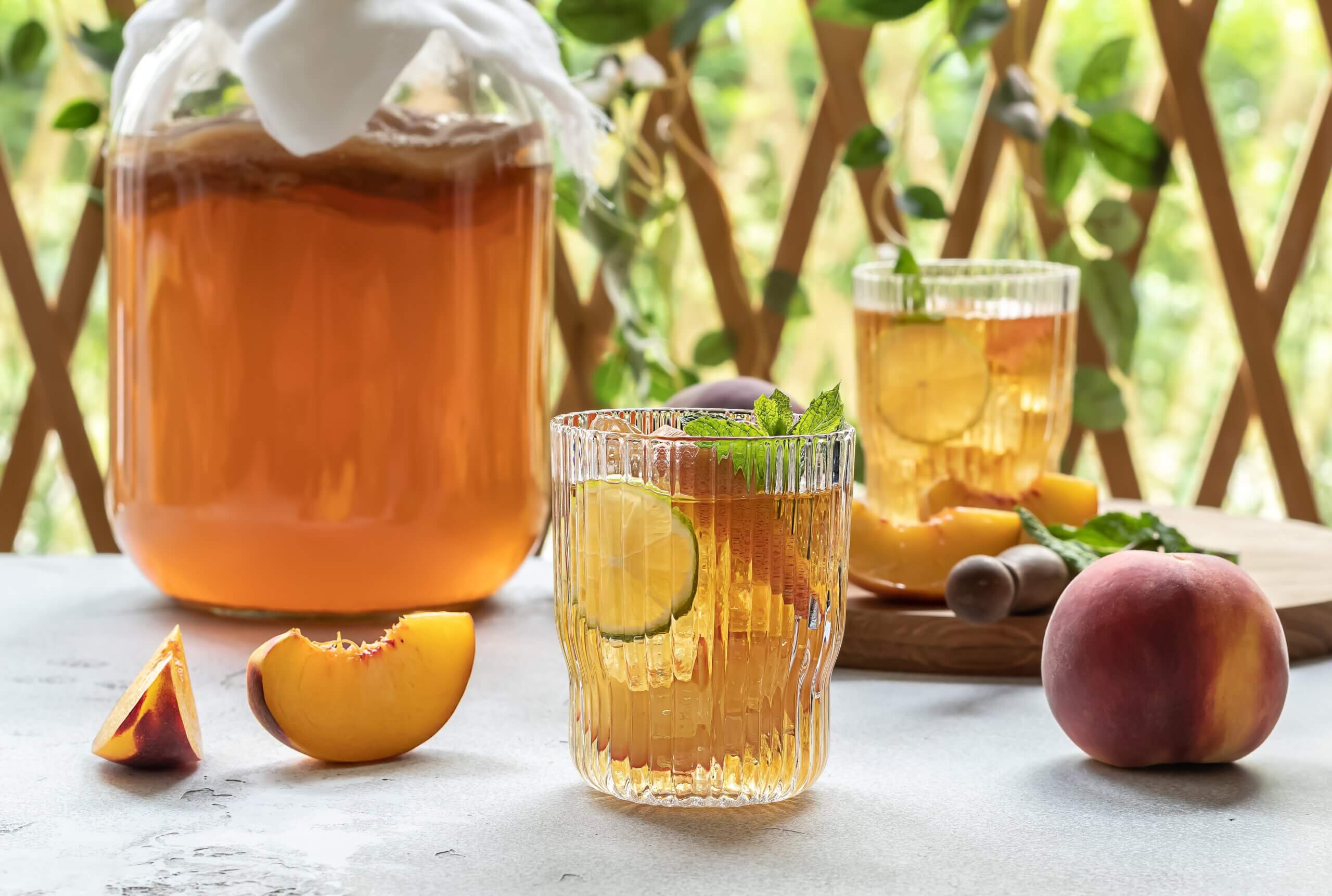 Kombucha in a package with ingredients for cooking. Fermented food.