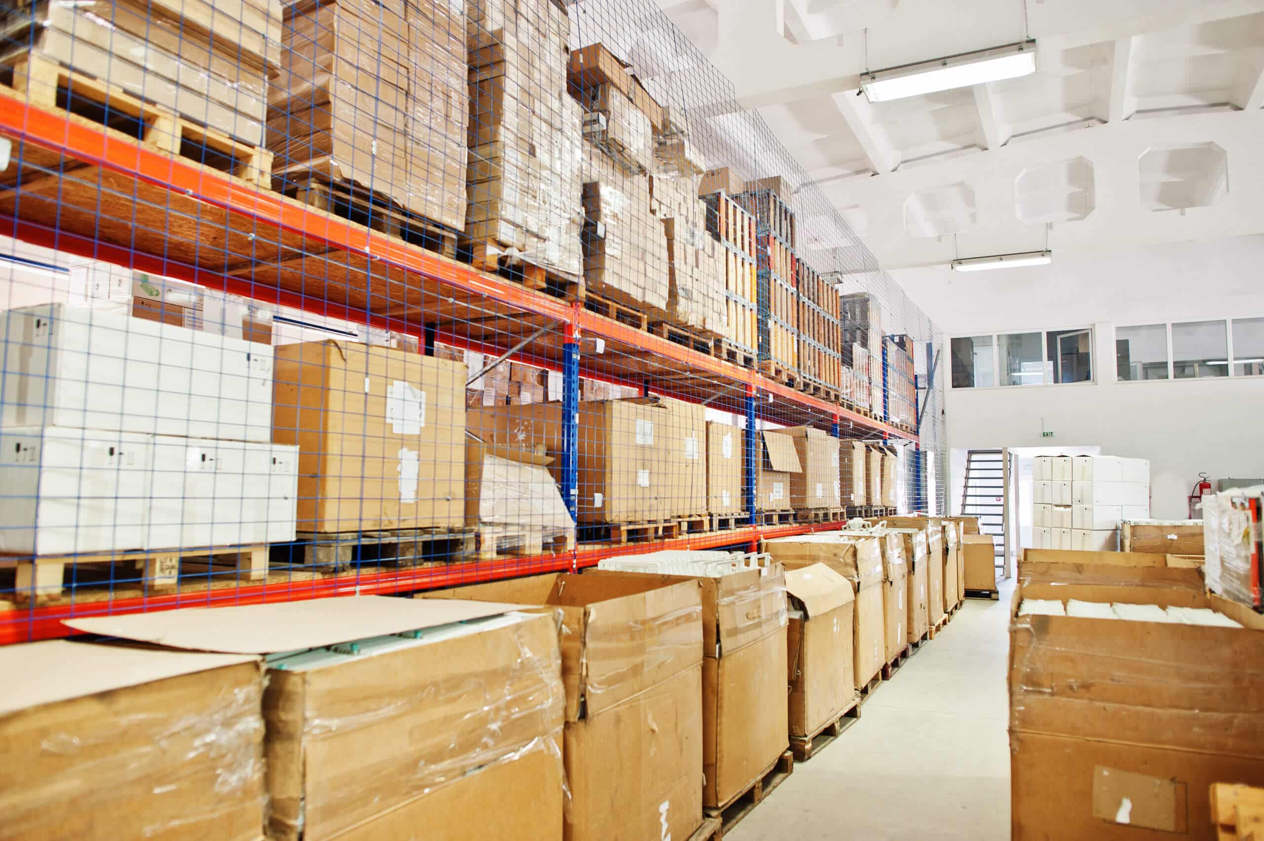 Interior of a modern warehouse storage of retail shop near shelves.