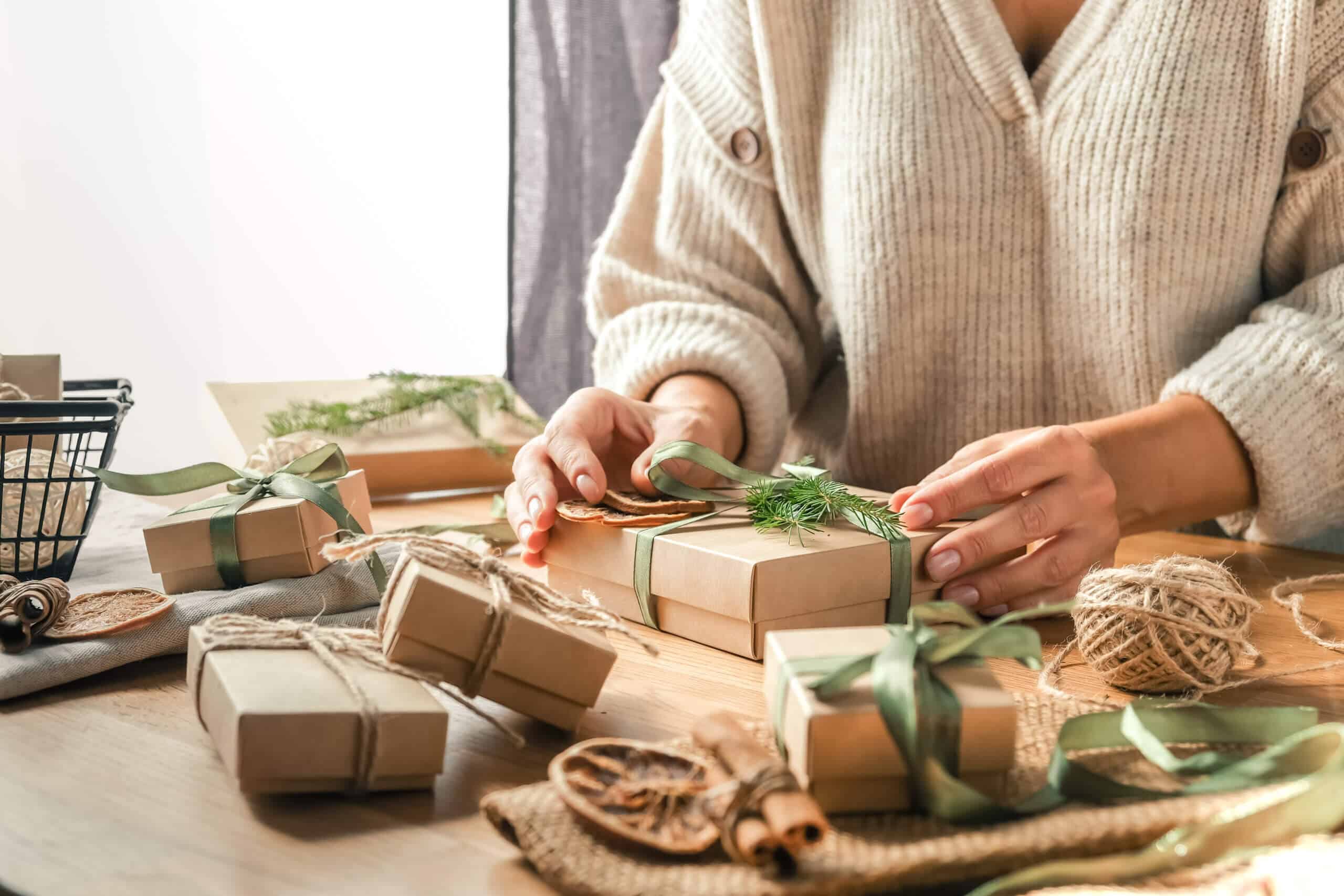 Christmas gift zero waste, eco friendly hand made box packaging gifts in kraft paper wooden table, eco christmas holiday concept, Christmas gift wrapping,eco decor banner