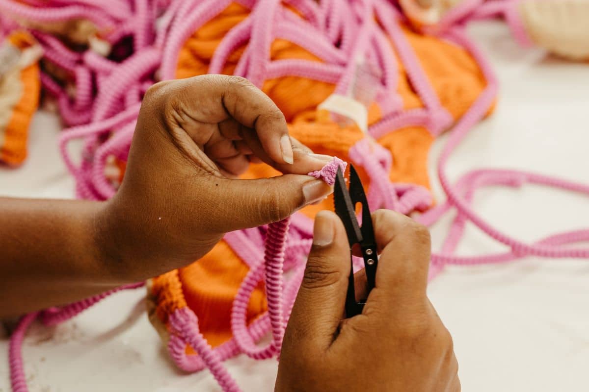Woman preparing a private label swimwear brand