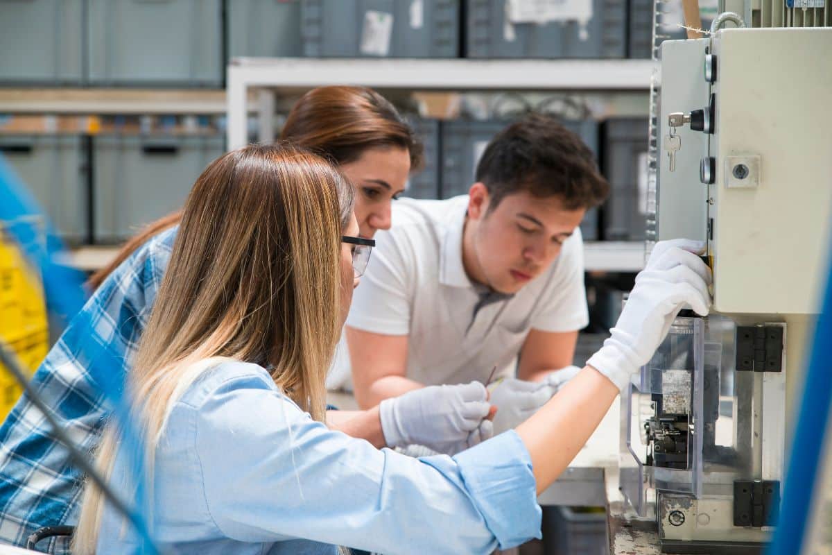 Employees working on manufacturing a new product