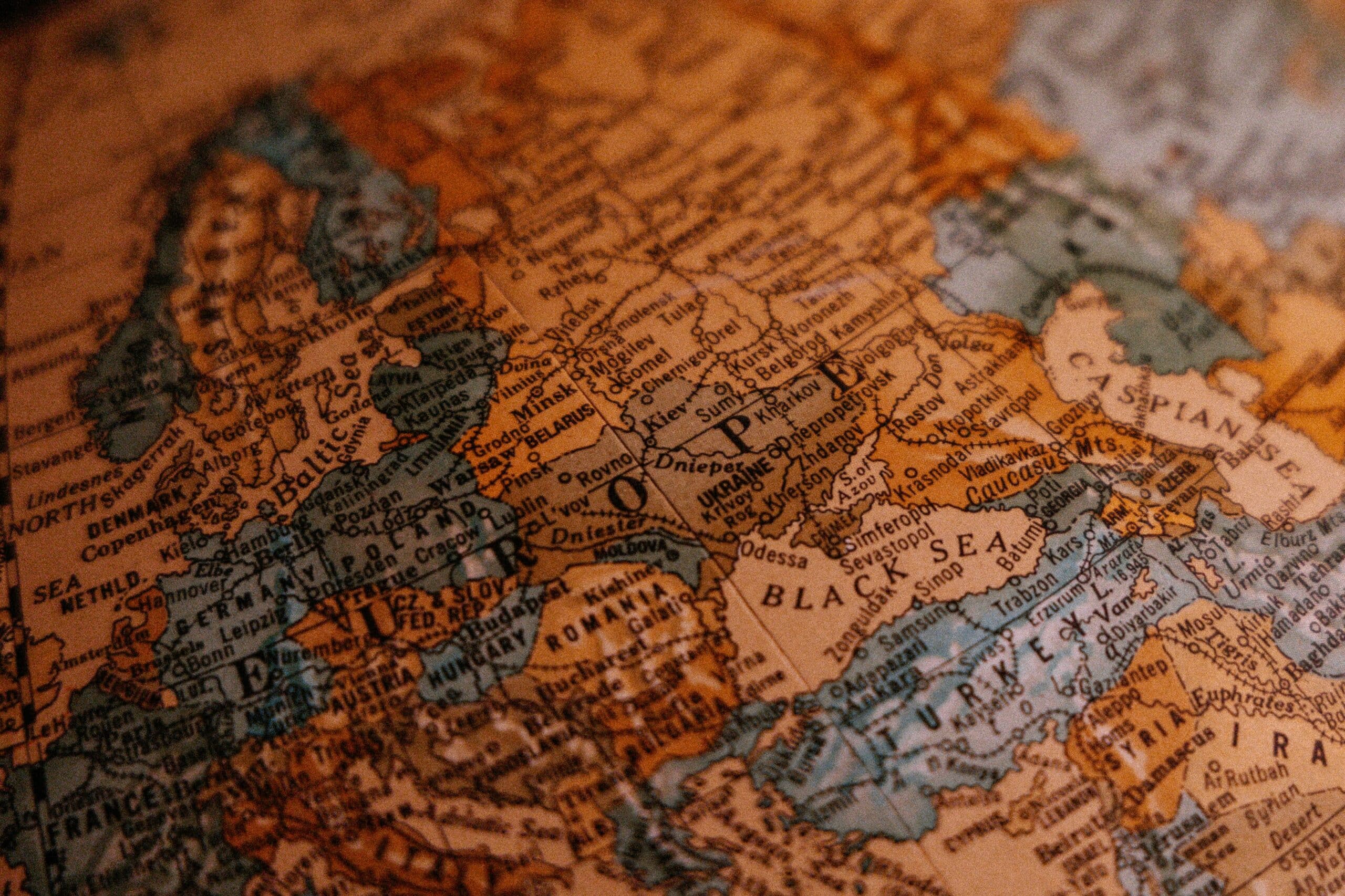 A close up photo of a globe showing Europe.